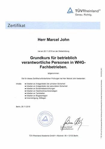 TÜV Rheinland Zertifikat für Marcel John über die Teilnahme am Grundkurs für betrieblich verantwortliche Personen in WHG-Fachbetrieben